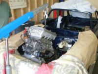 Carefully lifting the engine into position Alfa Romeo giulia 2000 1750 gtv gt veloce Berlina 1968 restoration restauratie rebuild