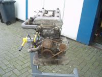 The engine mounted on the new stand. All dirty Alfa Romeo giulia 2000 1750 gtv gt veloce Berlina 1968 restoration restauratie rebuild